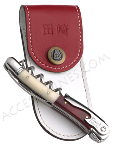 Chateau Laguiole Ch&acirc;teau Laguiole Grand Cru, Shinya Tasaki, Meilleur Sommelier du Monde 1995 au concours de Tokyo - Japon a choisi son sommelier en rouge et blanc, comme les couleurs de son pays, son nom est grav� sur le levier.